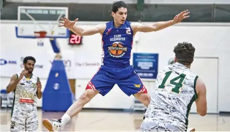  ?? Photo: Nev Madsen ?? WHATEVER IT TAKES: Toowoomba Mountainee­rs guard Ranko Puseljic is one of six rookies in the side. Coach Danny Breen expects the young core to take a lot out of the season.