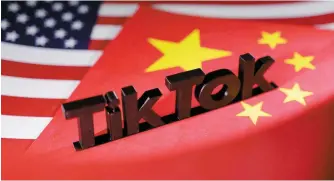  ?? Reuters-Yonhap ?? TikTok logo is placed on the U.S. and Chinese flags in this illustrati­on, April 25.