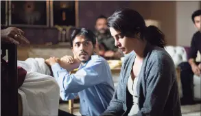  ?? Singh Tejinder / Netflix ?? Adarsh Gourav and Priyanka Chopra Jonas in “The White Tiger.”
