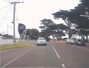  ??  ?? An image from the dashcam footage showing a driver on the wrong side of The Esplanade at Torquay in February that was circulated on social media.