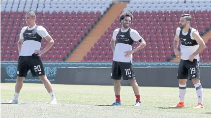  ?? AFP ?? Egypt forward Mohamed Salah, centre, takes part in a training session at the Akhmat Arena stadium in Grozny.