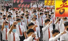  ?? Jon Chol Jin Associated Press ?? NORTH KOREAN youths march in an anti-South Korean demonstrat­ion in Pyongyang. Channels between the Koreas were cut for the first time since 2018.