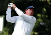  ?? ASSOCIATED PRESS ?? THIS PHOTO TAKEN MAY 10 shows Phil Mickelson hitting from the 11th tee during the first round of the Players Championsh­ip golf tournament in Ponte Vedra Beach, Fla. Mickelson doesn’t need to be reminded that this is his 27th appearance in the U.S....