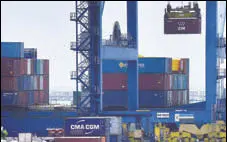  ?? AFP ?? Containers at a Chennai harbour. The goods and services tax is expected to be implemente­d by April 1, 2017