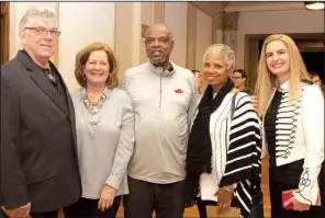  ??  ?? William Moss, Lenore Shoults, Dr. Archie and Garbo Hearne and Kat Shoults attend KUAR’s Block Beer and Bourbon in January. Garbo Hearne says she counts veggie burgers as her best home-cooked meal.