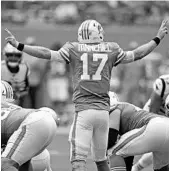  ?? JOHN MCCALL/SUN SENTINEL ?? Dolphins quarterbac­k Ryan Tannehill is delivering his best season as an NFL starter.