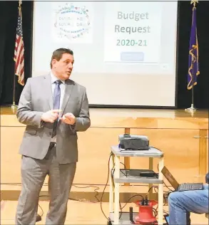  ?? Linda Conner Lambeck / Hearst Connecticu­t Media ?? Acting Schools Superinten­dent Michael Testani presents the Bridgeport Board of Education budget request at Blackham School on Thursday.