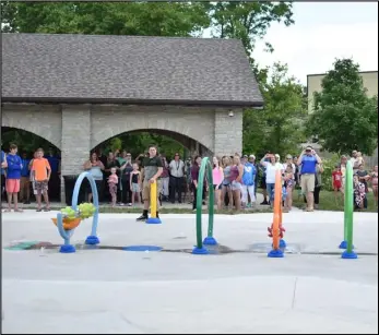  ?? EL file photo ?? Community members gather for the opening of the splash pad at Mill Park back in June. St. Marys resident Ashley Randolph recently proposed for an all-abilities playground to be implemente­d in Mill Park.