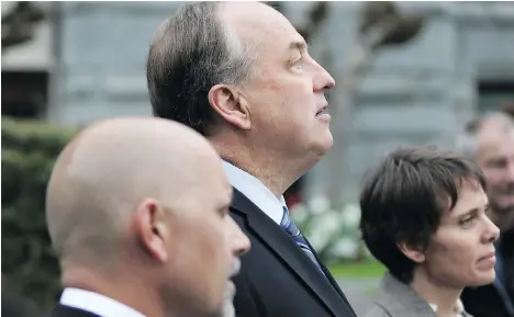  ?? CHAD HIPOLITO/THE CANADIAN PRESS ?? B.C. Green Party Leader Andrew Weaver is joined by elected party members Adam Olsen and Sonia Furstenau to speak to media on the legislatur­e grounds in Victoria, Wednesday. The “B.C. Greens finally defeated fear,” says federal party leader Elizabeth May.