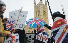  ?? TOLGA AKMEN/AGENCE FRANCE-PRESSE TOLGA AKMEN/AGENCE FRANCE-PRESSE ?? The U.K. Parliament will be on recess from Dec. 20 to Jan. 7, during which time May hopes voters will push lawmakers toward a Brexit deal.