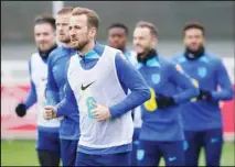  ?? ?? England’s Harry Kane warms up during a training session ahead of Thursday’s Euro 2024 qualifying soccer match against Italy, at St. George’s Park, Burton-on-Trent, England. (AP)