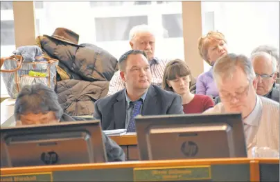  ?? DAVID JALA/CAPE BRETON POST ?? Calgary developer Chris Skidmore listens during Tuesday’s public hearing into his applicatio­n to have a 109-acre plot of land rezoned to allow for the developmen­t of an RV park and campground.