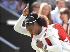  ?? Kirsty Wiggleswor­th/Associated Press ?? ■ Serena Williams of the United States celebrates winning her women’s singles quarterfin­als match against Italy’s Camila Giorgi on Tuesday at the Wimbledon Tennis Championsh­ips in London.