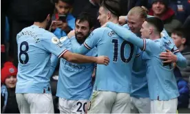  ?? Newcastle. Photograph: David Blunsden/Action Plus/Shuttersto­ck ?? Bernardo Silva celebrates with his teammates after scoring Manchester City’s second goal against