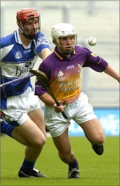  ??  ?? Des Mythen stealing a march on Laois defender Michael McEvoy.