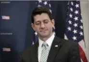  ?? PHOTOS BY THE ASSOCIATED PRESS ?? House Speaker Paul Ryan of Wisconsin pauses during a news conference on Capitol Hill in Washington, Tuesday.