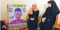  ?? Agence France-presse ?? The mother (centre) of Mohammad Ayoub and other relatives mourn at their home in Beit Lahia in the northern Gaza Strip on Saturday.