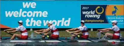  ?? MERLIN SOETERS, ROWING CANADA ?? Ancaster’s Taylor Perry, far right, pulls on his oar for the Canadian men’s fours team at last week’s World Rowing Championsh­ip in Sarasota, Fla.