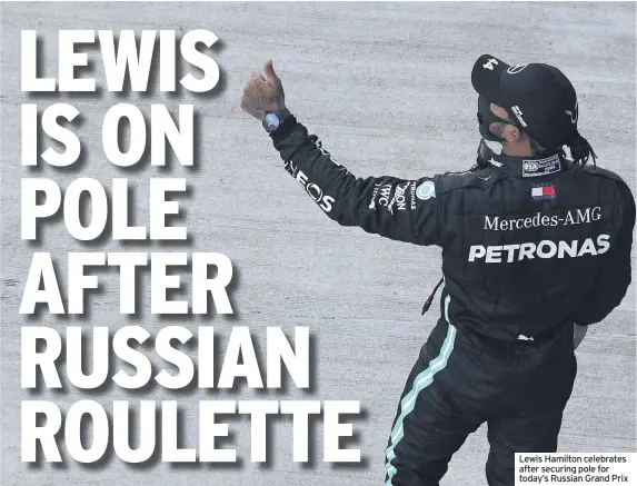  ??  ?? Lewis Hamilton celebrates after securing pole for today’s Russian Grand Prix