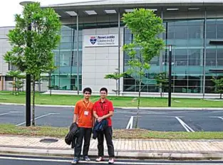  ??  ?? Muhamad Asif (right) and his college mate posing for a photo in front of the Sir Christophe­r Edwards building at NUMed.