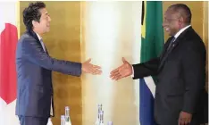  ?? Embassy in South Africa | Japanese ?? JAPANESE Prime Minister Shinzo Abe welcomes President Cyril Ramaphosa at the seventh Tokyo Internatio­nal Conference on African Developmen­t in Yokohama last year.