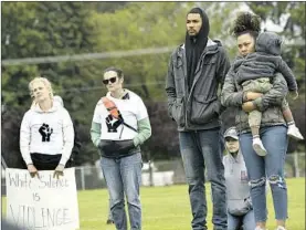  ?? Kathy Plonka Associated Press ?? DEMONSTRAT­ORS at a remembranc­e in Coeur d’Alene, Idaho, on Sunday for George Floyd, who was killed by Minneapoli­s police on May 25.