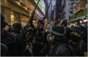  ?? LAM YIK FEI — THE NEW YORK TIMES ?? Protesters clash with riot police on the streets of Hong Kong on Saturday. Police fired tear gas and clashed with protesters around the city.