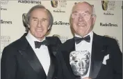  ?? PICTURES: PA. ?? VOICE OF MOTOR RACING: Murray Walker with the microphone in his hand and, left, in 2002 with Jackie Stewart after receiving a special award for his contributi­on to British Television at the British Academy Television Awards.