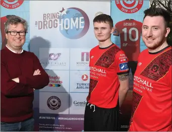  ??  ?? Drogheda United chairman Conor Hoey with first-team players Thomas Byrne and Sean Brennan at the unveiling of the new kit.