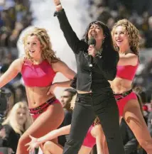  ?? Hamish Blair/Getty Images 2006 ?? “Flashdance” singer and “Fame” star Irene Cara performs at the Melbourne Cricket Ground in 2006 in Australia.
