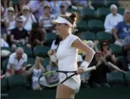  ?? KIRSTY WIGGLESWOR­TH — THE ASSOCIATED PRESS ?? Madison Brengle celebrates after ousting Petra Kvitova on Wednesday at Wimbledon.