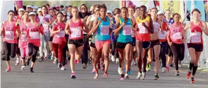  ??  ?? Scenes from the Dubai Women’s Run at the Meydan Race Course in Dubai on Friday.— KT photos by Grace Guino