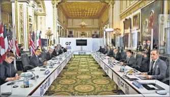  ?? AP ?? G7 foreign ministers are seated before the start of a meeting in London on Wednesday.