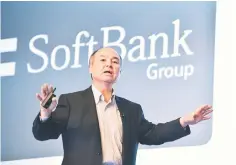  ??  ?? SoftBank founder Masayoshi Son speaks during a press conference to announce the company’s financial results in Tokyo. Uber and SoftBank announced a deal allowing the Japanese tech titan to take a large stake in the US ride-sharing giant, making a hefty...