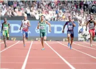  ??  ?? South Africa's Wayde Van Niekerk (C) leads the heats of the men's 400m athletics event at the 2017 IAAF World Championsh­ips at the London Stadium - AFP