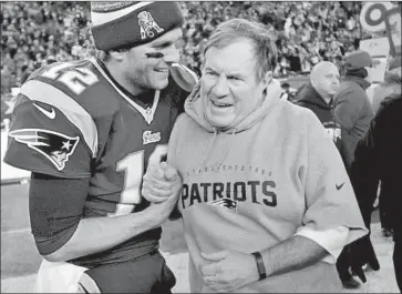  ?? Charles Krupa Associated Press ?? TOM BRADY and coach Bill Belichick teamed for six Super Bowl victories in New England. Now Brady will be coached in Tampa Bay by Bruce Arians, who isn’t wound quite as tightly as Belichick.