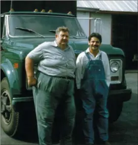  ?? SUBMITTED PHOTO ?? Sterling “Tiny” Zimmerman, a true grit farmer and butcher Dutchman, is pictured with folk singer son, stage name, Kenn Brooks also was a part of the historic Kutztown Folk Festival.