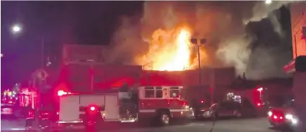  ?? — THE ASSOCIATED PRESS ?? This photo provided by the Oakland fire department shows the scene of a blaze in Oakland Saturday. Officials said it was the most deadly building fire in the city in recent memory.