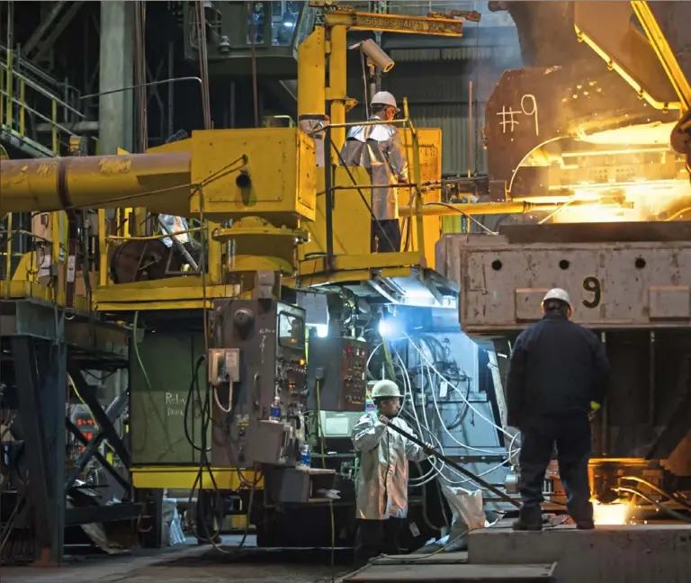  ??  ?? Molten steel is poured into molds in the caster to make steel slabs at the JSW Steel Ohio plant Feb. 14 in Mingo Junction, Ohio. Many new employees have never set foot in a steel mill, so the company c closed in 2008 to train the next generation.