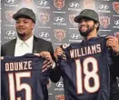  ?? DAVID BANKS/USA TODAY SPORTS ?? Bears first-round draft choices Rome Odunze, left, and Caleb Williams pose for photos at a news conference Friday in Lake Forest, Ill.