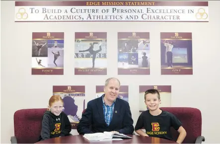  ?? RYAN MILLER. ?? Edge School principal Keith Taylor with Grade 4 students Emerson Proceviat and Liam Magnuson.