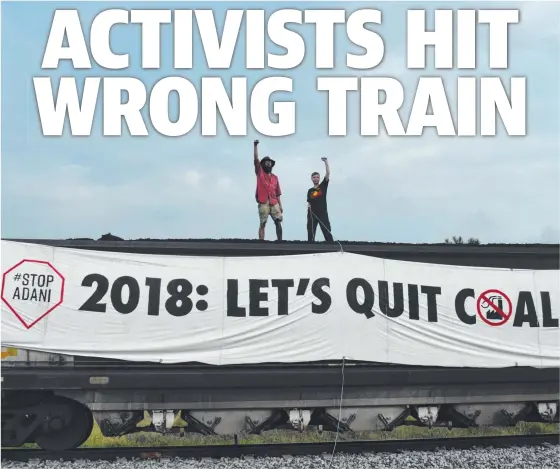  ?? OFF TRACK: Anti- Adani activists aboard the coal train which was said to be carrying coking coal, not thermal coal. Picture: FRONTLINE ACTION ON COAL ??