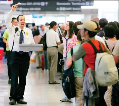  ?? TONY AVELAR/AP ?? Most travellers with unused marijuana will be forced to ditch their stashes before they check in for their flight. Lawyers say changes at the federal level will be required to resolve the mess of U.S. cannabis rules. Pot is illegal federally in the U.S., though certain states have legalized it.