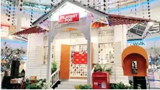  ?? — Bernama photo ?? The ‘post office’ in the mall, a collaborat­ion between Pos Malaysia and the Curve, comes complete with a mailbox and counter to allow visitors to send Raya greeting cards or gifts to their loved ones, with this service available every weekend from now until April 14.