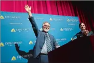 ?? JOSE LUIS MAGANA/AP PHOTO ?? Professor Gregg Semenza, accompanie­d by Johns Hopkins University President Ron Daniels, waves to the crowd during a news conference Monday after he was awarded the 2019 Nobel Prize in Medicine.