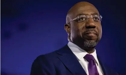  ?? Photograph: Anadolu Agency/ Getty Images ?? Raphael Warnock delivers a speech at his election night party in Atlanta, Georgia, on 6 December 2022.