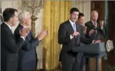  ?? CAROLYN KASTER - THE ASSOCIATED PRESS ?? House Speaker Paul Ryan of Wis., joined by Wisconsin Gov. Scott Walker, left, Vice President Mike Pence, Terry Gou, president and chief executive officer of Foxconn, and Sen. Ron Johnson, R-Wis., speaks in the East Room of the White House in...