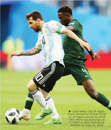  ??  ?? Lionel Messi (10) of Argentina is tackled by Wilfred Ndidi (4) of Nigeria during the 2018 FIFA World Cup Russia group D match at Saint Petersburg Stadium on June 26, 2018