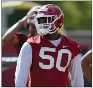  ?? (NWA Democrat-Gazette/Andy Shupe) ?? Arkansas defensive end Eric Gregory said Coach Sam Pittman remains involved with the Razorbacks’ preparatio­ns even while he is in quarantine after receiving a second positive covid-19 test.