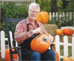  ?? (Courtesy Photo/SDC) ?? Master pumpkin carver Barry Brown, who lives in Colorado, has carved a series of Silver Dollar City's iconic landmarks, including the steam train.